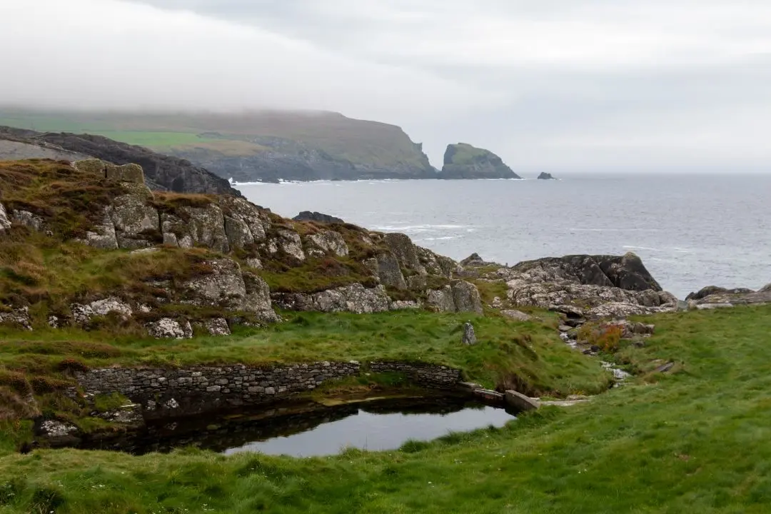 three castle head water cliff atlantic ocean