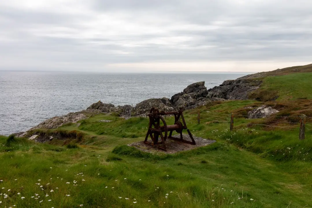 three castle head winch in front of atlantic ocean